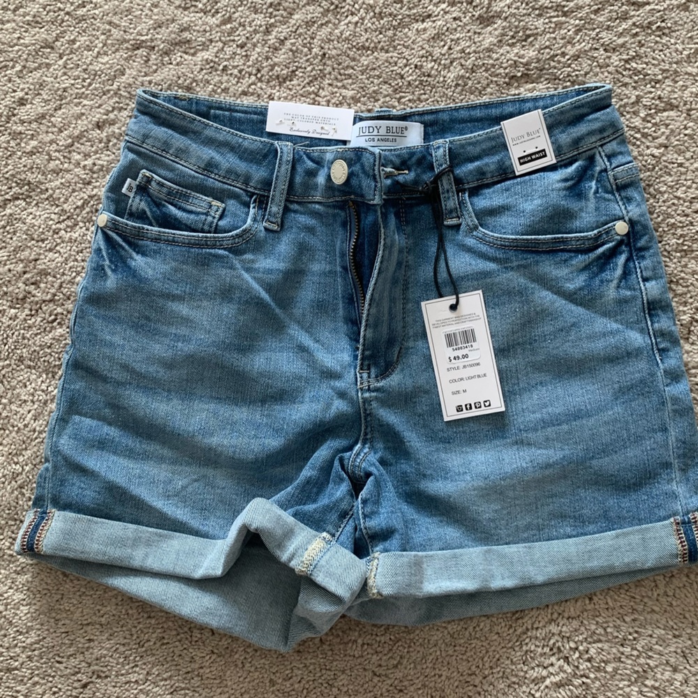 NEW Denim Shorts. Light blue wash. Size Medium.